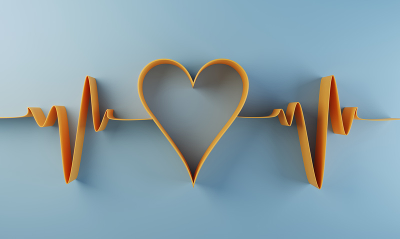 Heart monitor lines with a heart shape in the middle