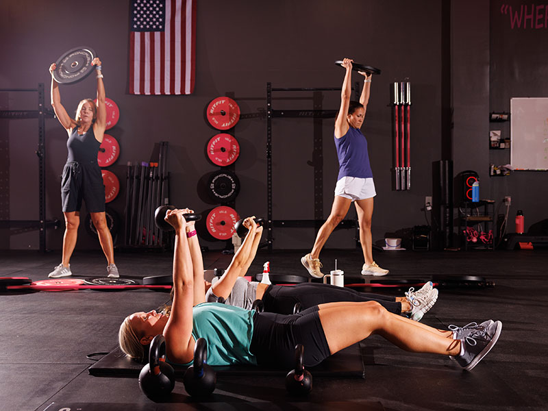 Woman in Girl Crush Fitness gym working out