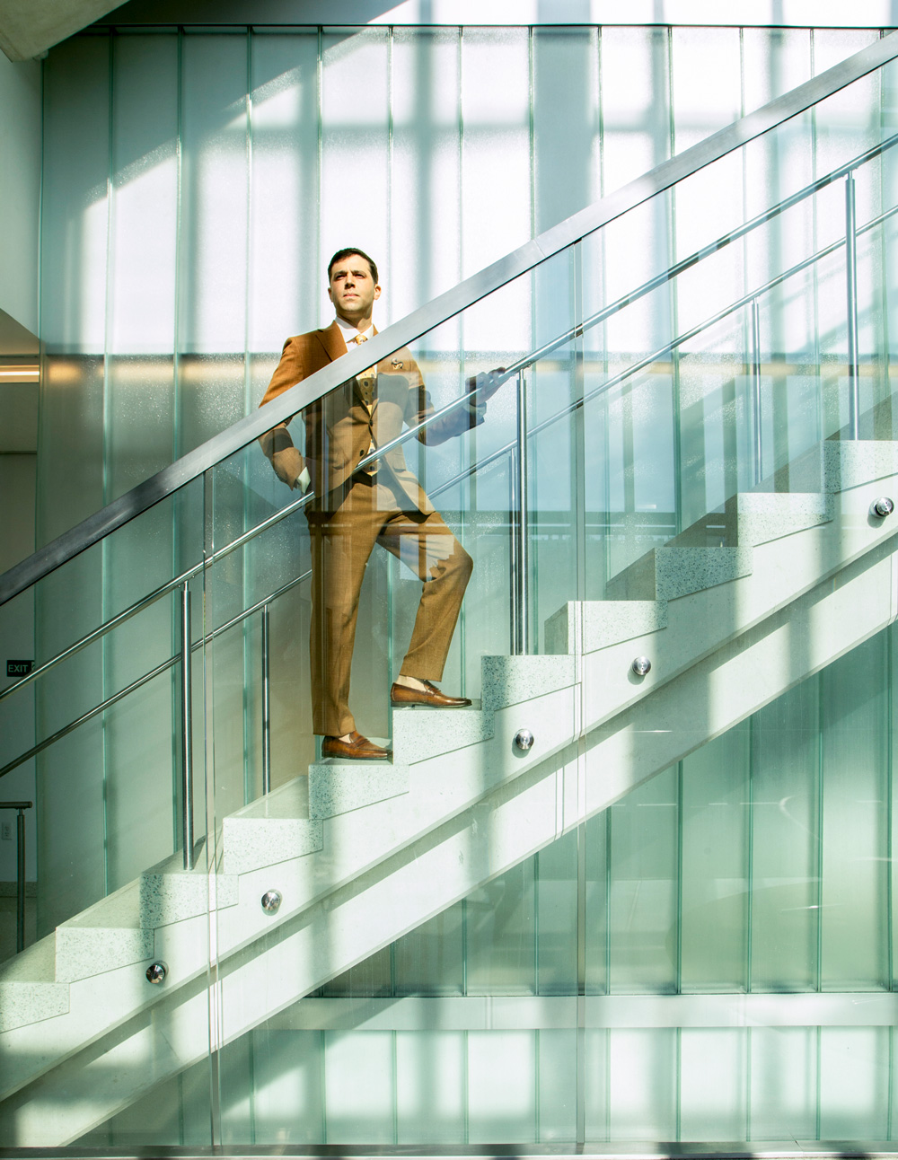 Khalil seen going up a set of stairs