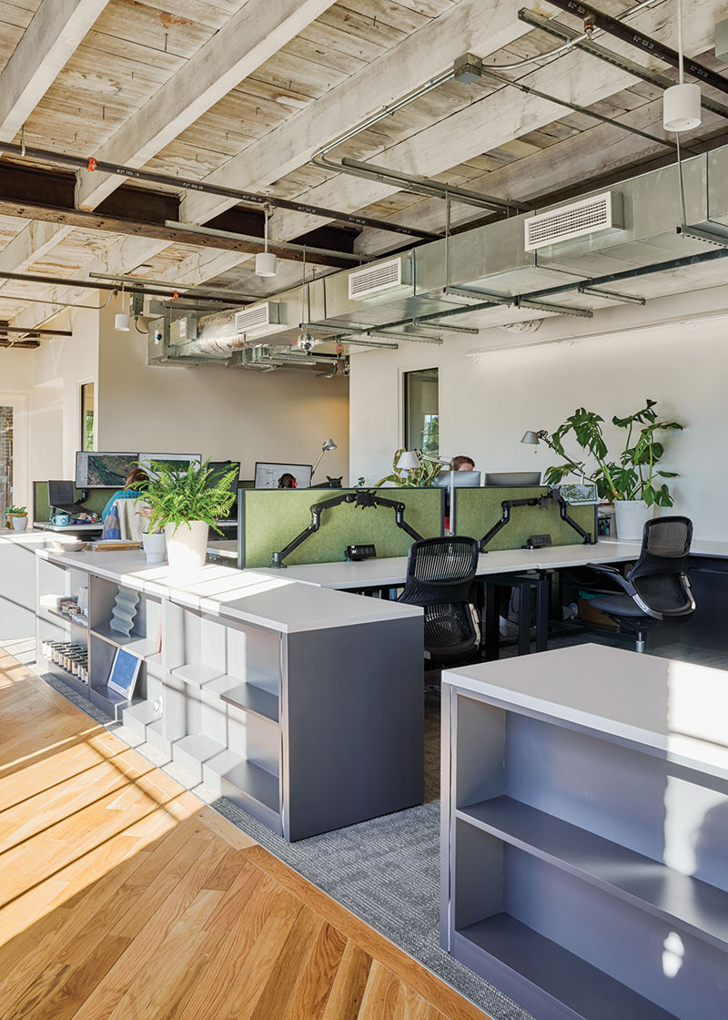 Another shot of the workspace's desks at a more angled view