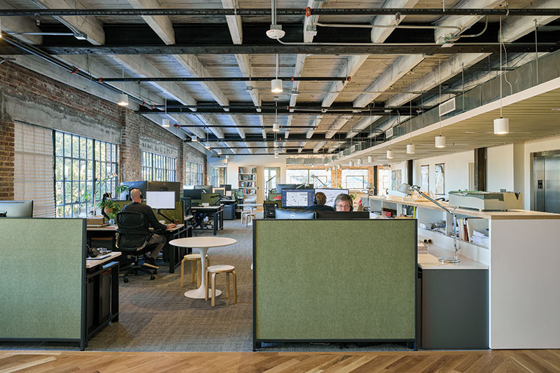 Interior of Wagonner & Ball -- straightforward shot of the workspaces, desks, main room